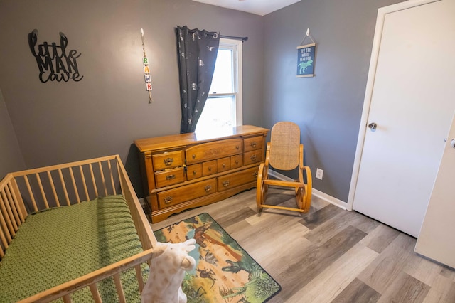 1291 103rd Ave, Plainwell, MI 49080 - bedroom featuring light wood-style flooring