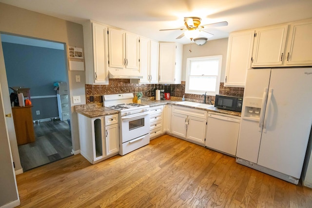 1291 103rd Ave, Plainwell, MI 49080 - kitchen featuring white appliances, under cabinet range hood, a sink, ceiling fan, and tasteful backsplash