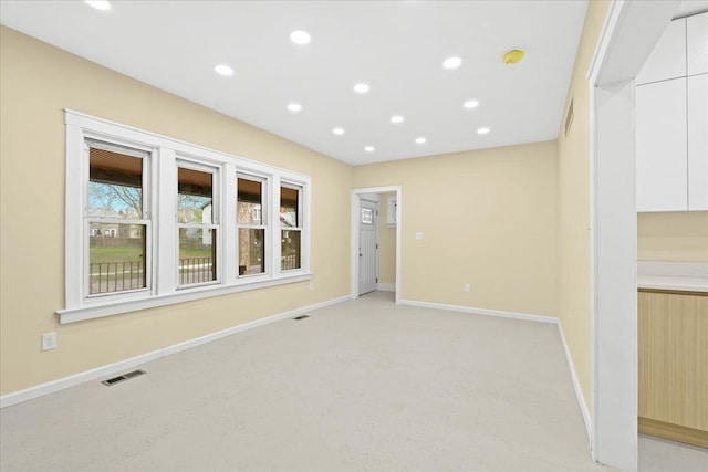 475 Algonquin St, Detroit, MI 48215 - empty room with baseboards, recessed lighting, a smoke detector, and light colored carpet