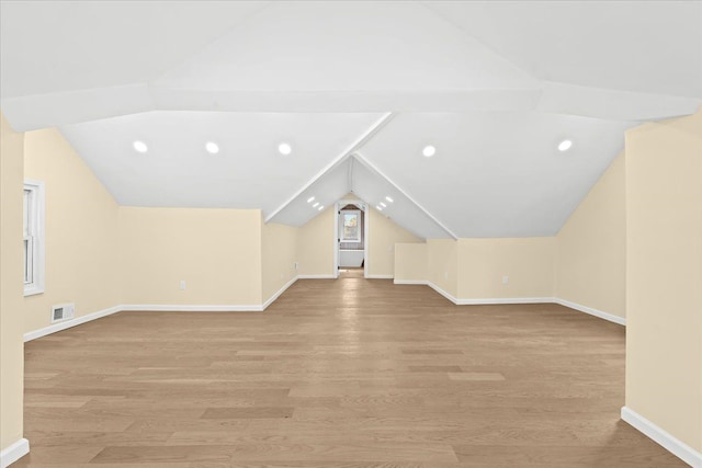475 Algonquin St, Detroit, MI 48215 - bonus room featuring vaulted ceiling, baseboards, light wood-style floors, and recessed lighting