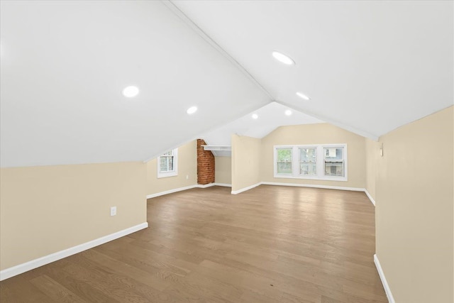 475 Algonquin St, Detroit, MI 48215 - additional living space featuring baseboards, wood finished floors, recessed lighting, and lofted ceiling