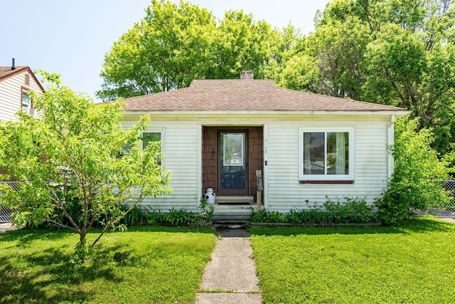 2170 Sonoma St, Ferndale, MI 48220 - bungalow-style home featuring a chimney and a shingled roof