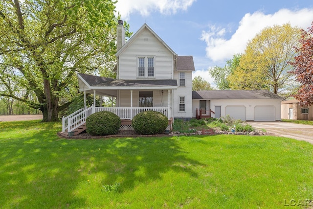 11160 W Ridgeville Rd, Morenci, MI 49256 - view of front facade with covered porch, a chimney, a garage, a front yard, and concrete driveway