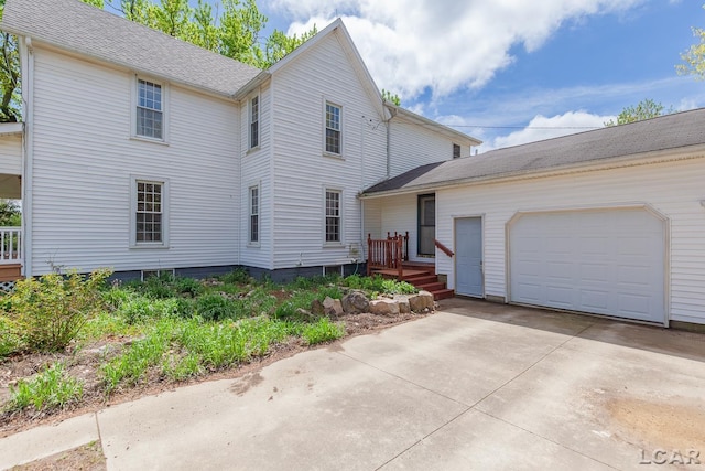 11160 W Ridgeville Rd, Morenci, MI 49256 - traditional-style home with driveway and a garage