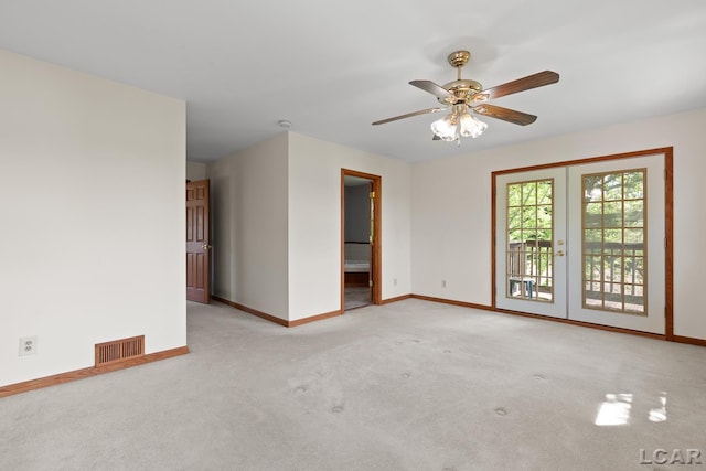 11160 W Ridgeville Rd, Morenci, MI 49256 - spare room featuring carpet floors, baseboards, and a ceiling fan