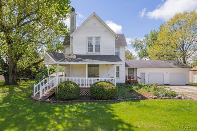 11160 W Ridgeville Rd, Morenci, MI 49256 - view of front of house featuring a porch, driveway, a garage, a chimney, and a front yard