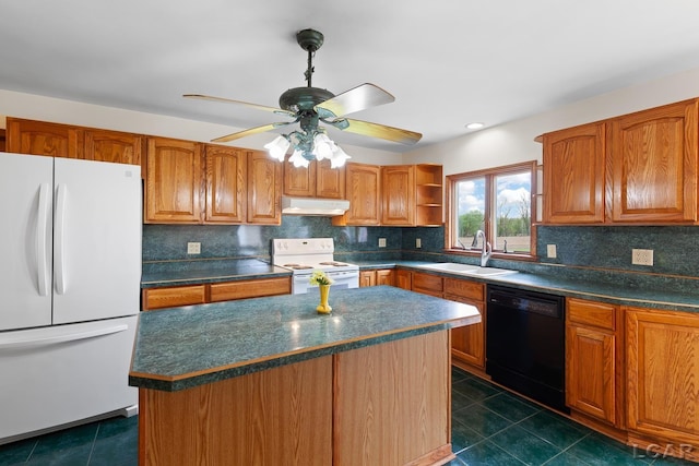 11160 W Ridgeville Rd, Morenci, MI 49256 - kitchen with white appliances, a sink, under cabinet range hood, dark countertops, and recessed lighting