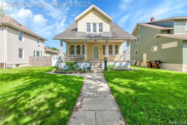 414 Riverview Ave, Monroe, MI 48162 - view of front of home with a porch and roof with shingles