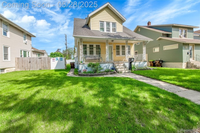 414 Riverview Ave, Monroe, MI 48162 - view of front facade with covered porch and roof with shingles