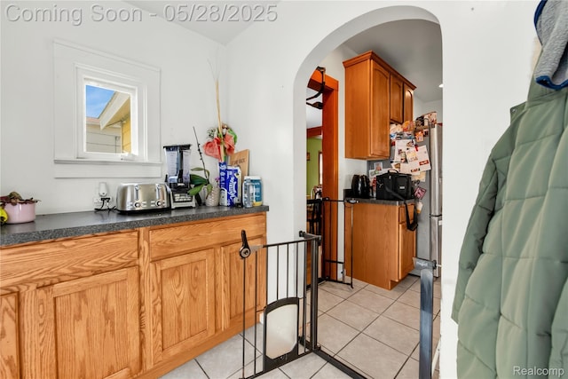 414 Riverview Ave, Monroe, MI 48162 - bar with arched walkways and light tile patterned floors