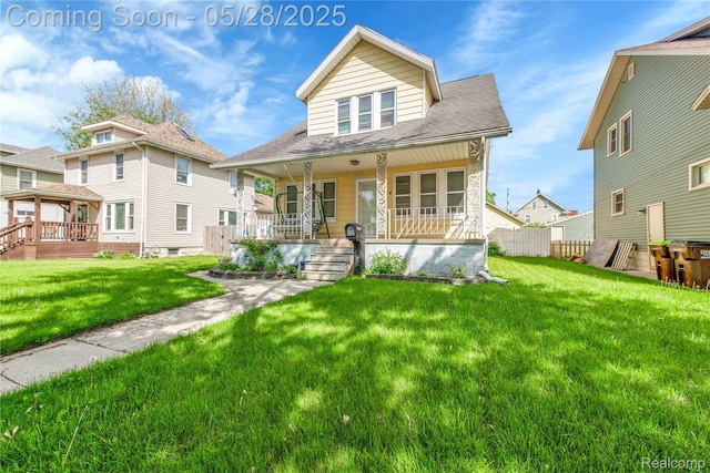 414 Riverview Ave, Monroe, MI 48162 - view of front of house with covered porch and a front yard