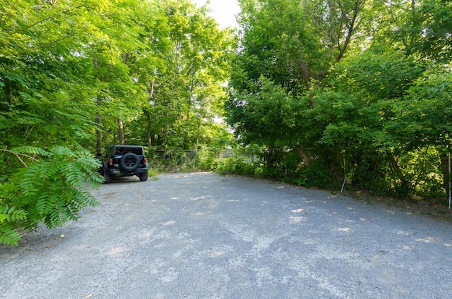 view of parking with driveway