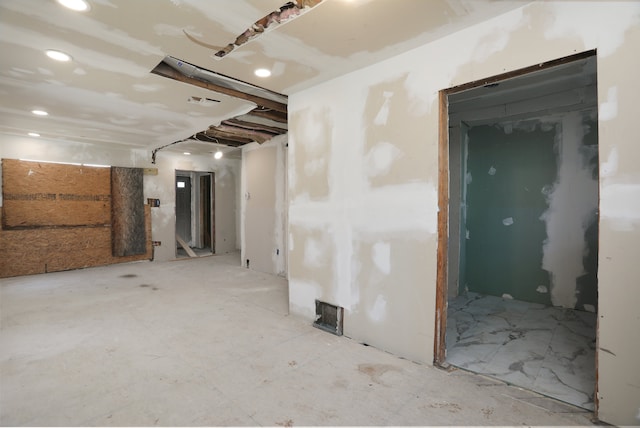 unfurnished room featuring recessed lighting