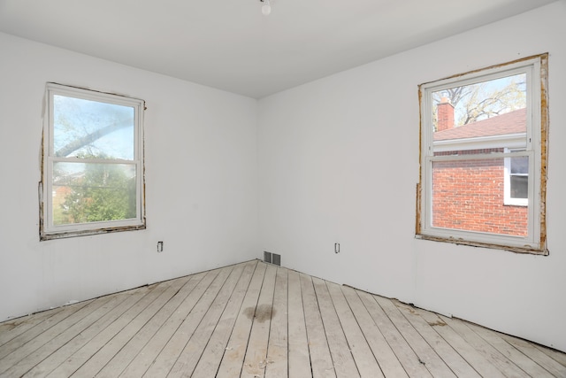 empty room with light wood-style floors
