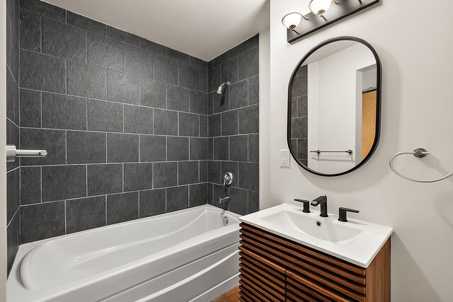 bathroom with shower / tub combination and vanity