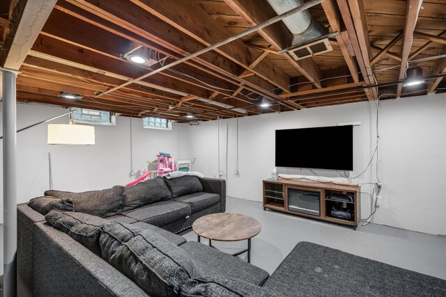 living area with finished concrete flooring