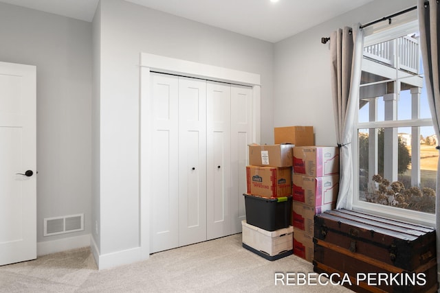 4497 Point Superior Ct, Holland, MI 49424 - carpeted bedroom with baseboards and a closet