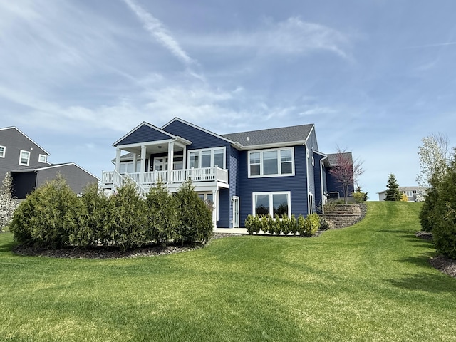 4497 Point Superior Ct, Holland, MI 49424 - rear view of house featuring a lawn