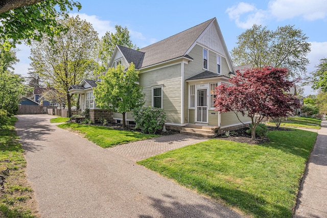 view of front of home featuring a shingled roof