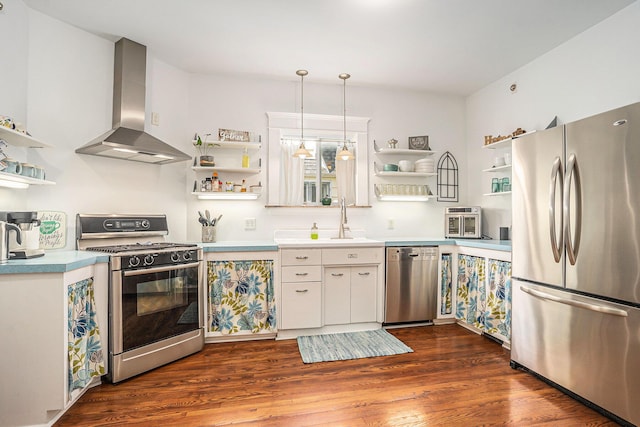kitchen featuring appliances with stainless steel finishes, open shelves, wall chimney range hood, dark wood-style flooring, and light countertops