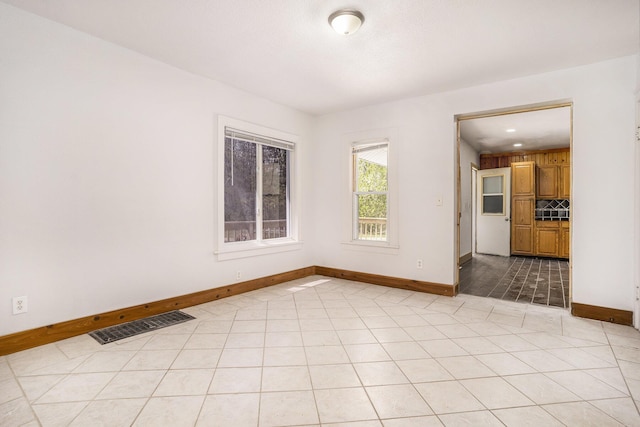5128 Heights Ravenna Rd, Fruitport, MI 49415 - unfurnished room featuring baseboards