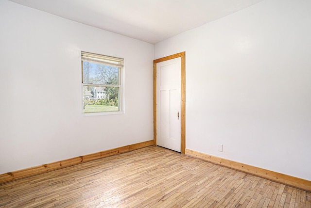 5128 Heights Ravenna Rd, Fruitport, MI 49415 - unfurnished room featuring light wood-type flooring and baseboards