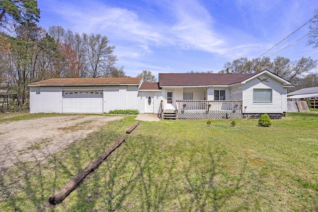 5128 Heights Ravenna Rd, Fruitport, MI 49415 - ranch-style house featuring dirt driveway, a front lawn, and covered porch