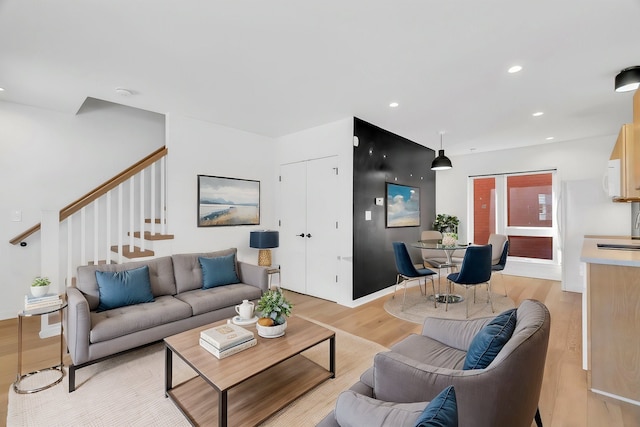 112 Mount Vernon St, Detroit, MI 48202 - living area featuring light wood finished floors, recessed lighting, and stairs