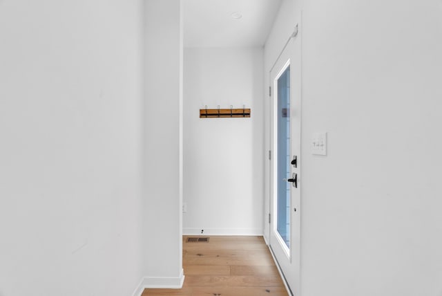 112 Mount Vernon St, Detroit, MI 48202 - doorway with light wood finished floors and baseboards