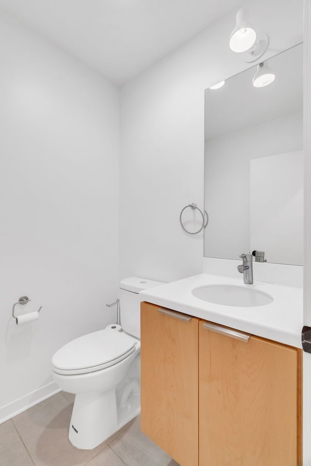 112 Mount Vernon St, Detroit, MI 48202 - half bath with toilet, vanity, and tile patterned floors