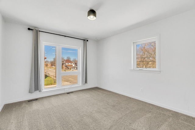 112 Mount Vernon St, Detroit, MI 48202 - carpeted empty room with healthy amount of natural light and baseboards