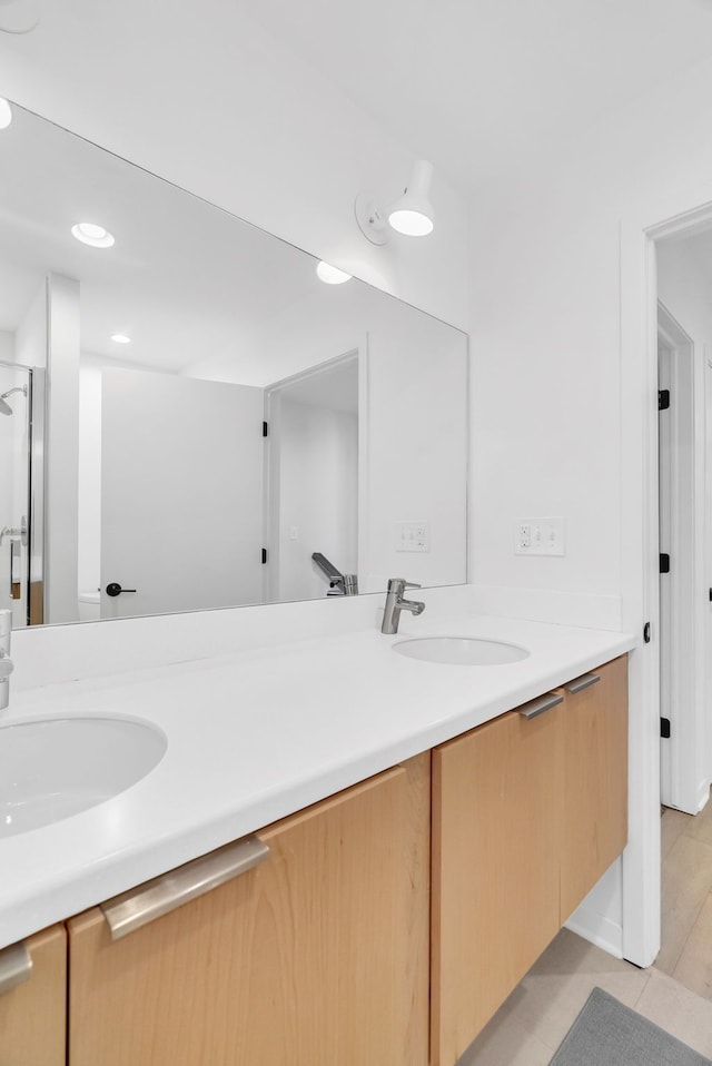 112 Mount Vernon St, Detroit, MI 48202 - bathroom featuring double vanity, tile patterned flooring, a shower stall, and recessed lighting