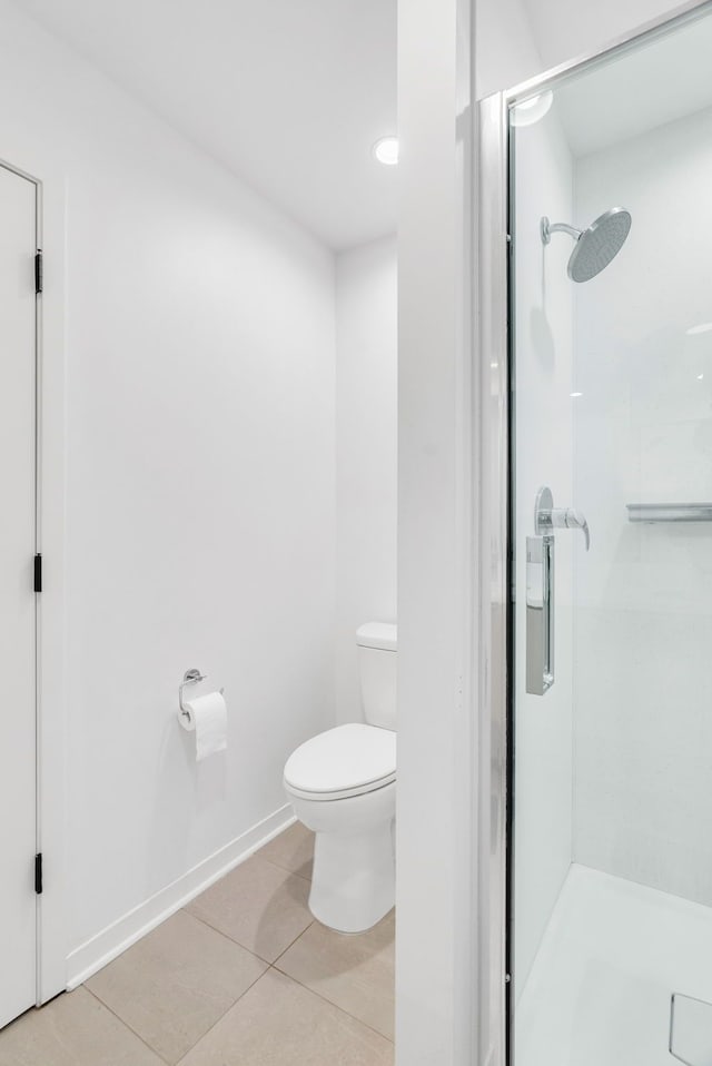 112 Mount Vernon St, Detroit, MI 48202 - bathroom with toilet, a stall shower, and tile patterned floors