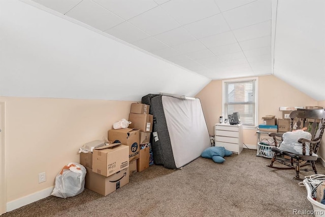 bonus room featuring carpet flooring and lofted ceiling