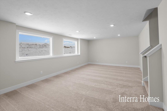 3772 Ambrosia Dr SW Unit 25, Grand Rapids, MI 49534 - basement featuring carpet floors, recessed lighting, baseboards, and stairs