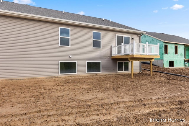 3772 Ambrosia Dr SW Unit 25, Grand Rapids, MI 49534 - back of house featuring a deck and a shingled roof