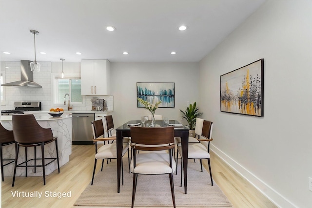 25720 Southwood Dr, Southfield, MI 48075 - dining area featuring light wood finished floors, recessed lighting, and baseboards