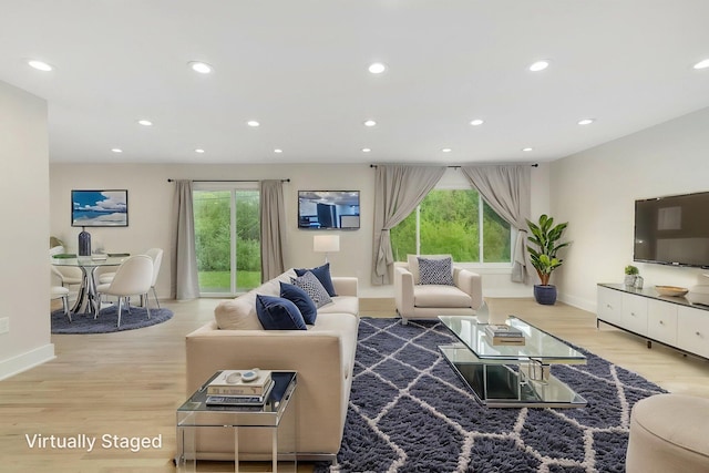 25720 Southwood Dr, Southfield, MI 48075 - living room with wood finished floors, baseboards, healthy amount of natural light, and recessed lighting