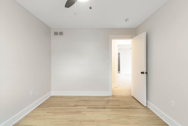 25720 Southwood Dr, Southfield, MI 48075 - unfurnished room featuring ceiling fan, light wood-style floors, and baseboards