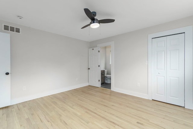 25720 Southwood Dr, Southfield, MI 48075 - unfurnished bedroom with wood finished floors, baseboards, connected bathroom, a closet, and ceiling fan