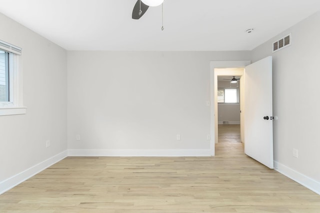 25720 Southwood Dr, Southfield, MI 48075 - empty room with a ceiling fan, light wood-style floors, and baseboards