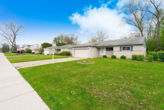 25720 Southwood Dr, Southfield, MI 48075 - single story home featuring driveway, a garage, a front yard, and brick siding