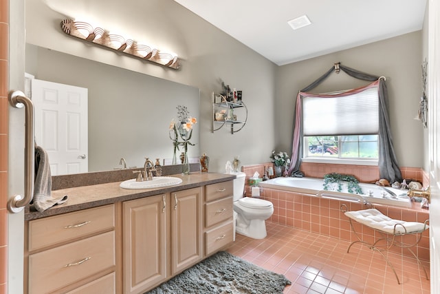 61450 Wedgewood Dr, Washington, MI 48094 - bathroom featuring tile patterned flooring, vanity, a garden tub, and toilet