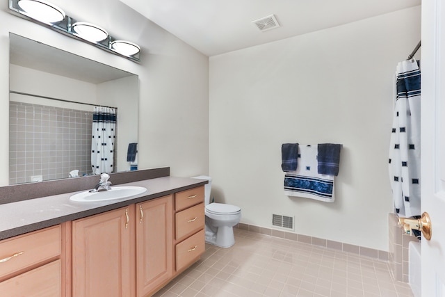 61450 Wedgewood Dr, Washington, MI 48094 - bathroom with vanity, tile patterned flooring, and toilet
