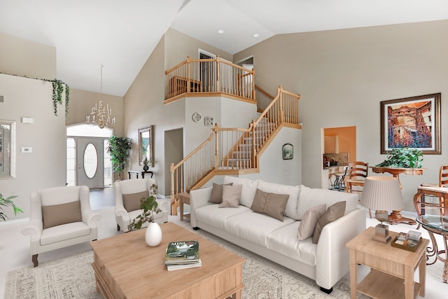 61450 Wedgewood Dr, Washington, MI 48094 - living area featuring high vaulted ceiling, stairway, and a chandelier