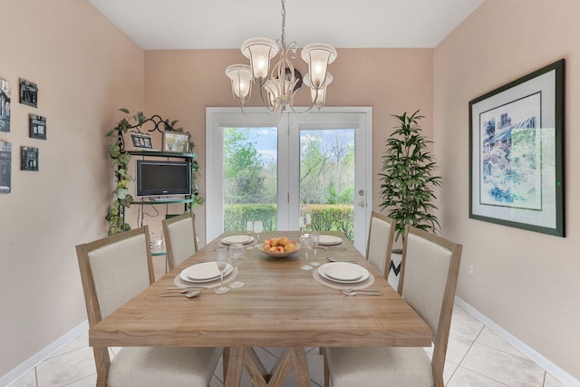 61450 Wedgewood Dr, Washington, MI 48094 - dining area featuring light tile patterned floors, a chandelier, and baseboards