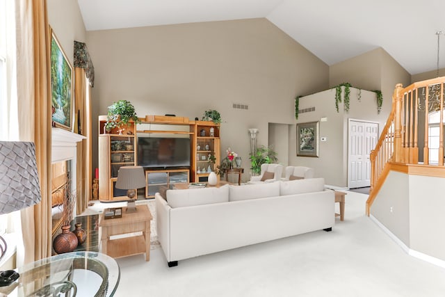 61450 Wedgewood Dr, Washington, MI 48094 - living area featuring stairway, carpet, high vaulted ceiling, and baseboards