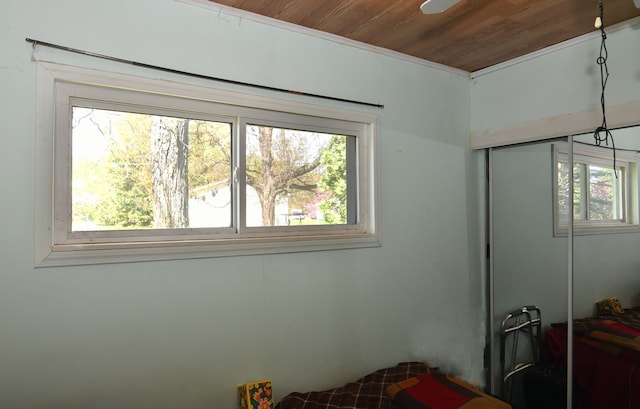 1209 Applewood Dr, White Lake, MI 48386 - bedroom featuring wood ceiling and a closet