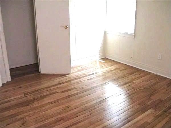 13892 Eastburn St, Detroit, MI 48205 - unfurnished room with wood finished floors and baseboards