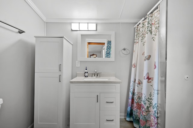 bathroom with ornamental molding, vanity, and a shower with shower curtain